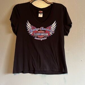 2 Ladies Harley Davidson shirts.